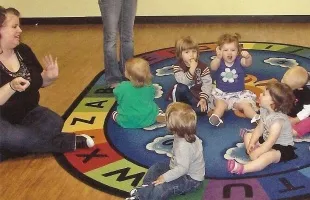 Children playing in a circle